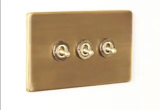 Three Gang 2 way florence toggle switching brass2.jpg