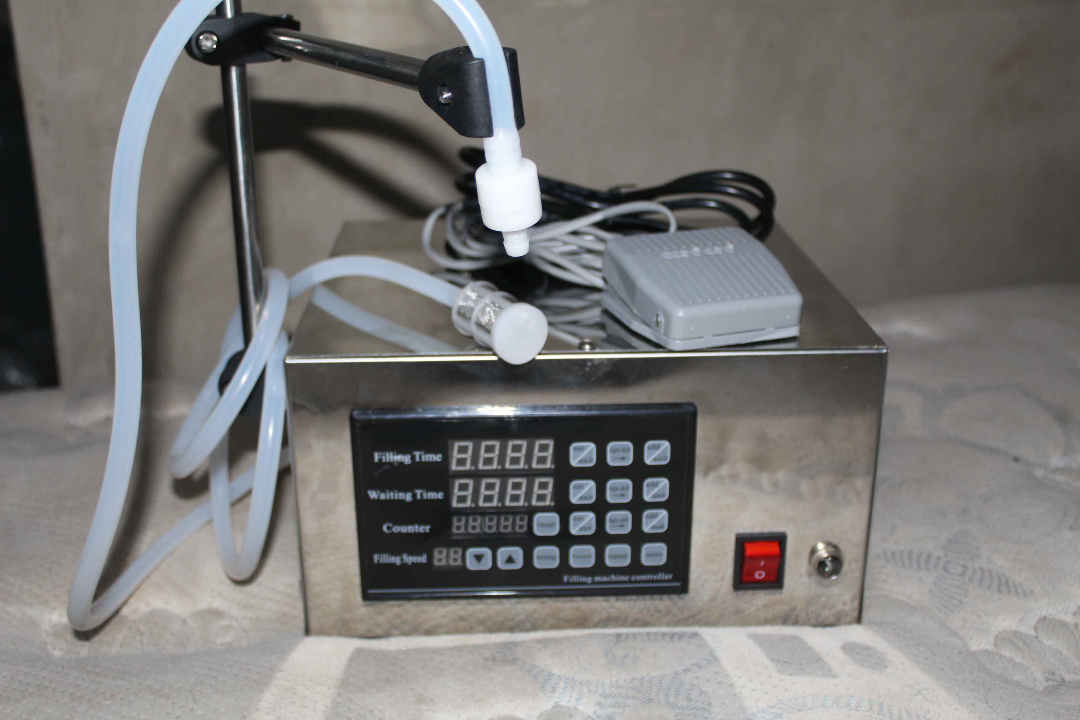 automatic Liquid bottle filling machine in GH
